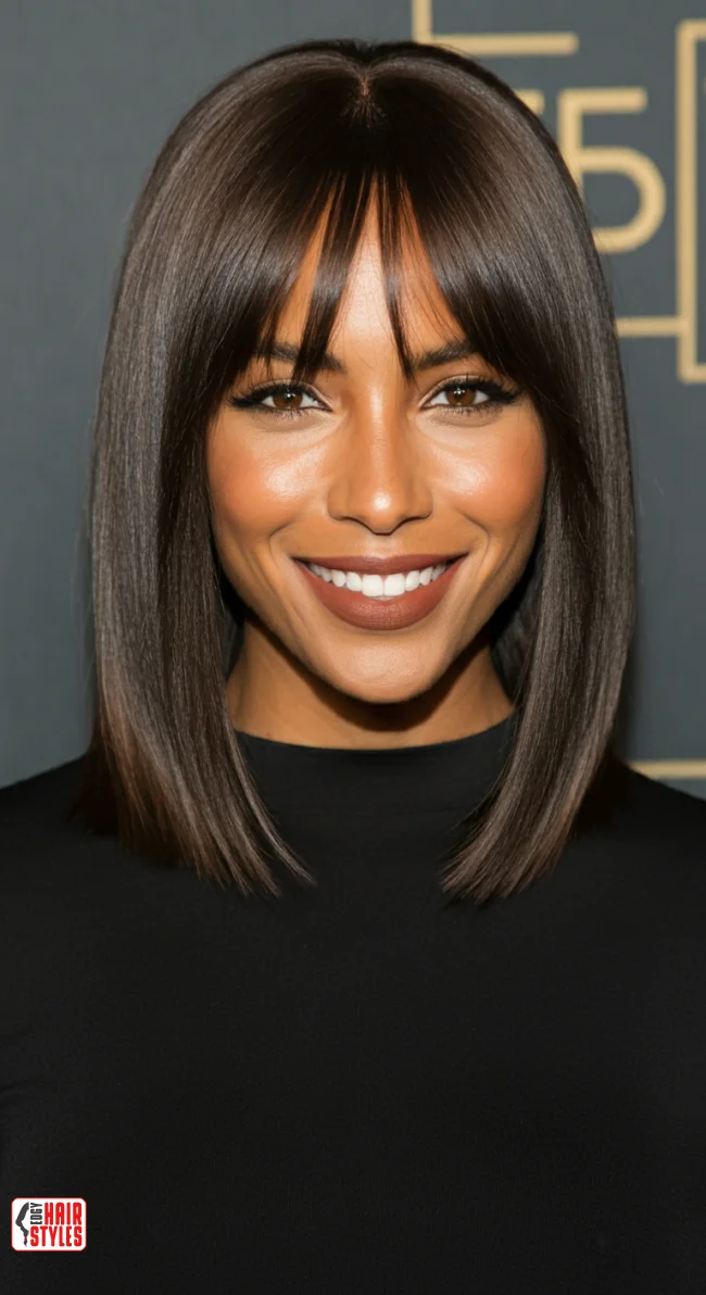 7. Sleek Lob With Feathered Bangs | 10 Low-Maintenance Medium-Length Hairstyles With Bangs