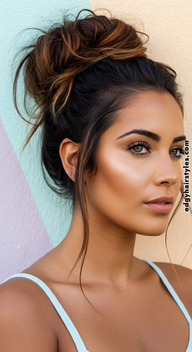 9. Messy Bun with Wispy Strands | Hairstyles That Make You Look Younger Without Botox